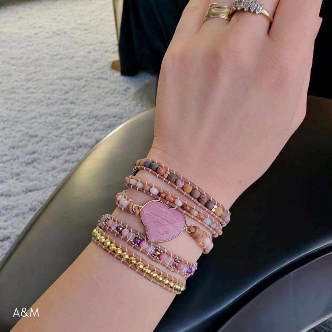 Five-wrap bohemian bracelet made with Picasso Jasper beads and a rhodonite heart charm, handcrafted in earthy tones for a natural, spiritual style.