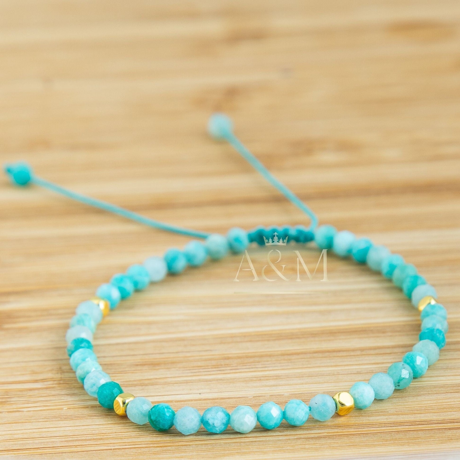 Handmade minimalist bracelet featuring 4mm faceted amazonite beads, known for their soothing blue-green color. Adjustable design, perfect for adding a calming, nature-inspired touch to your jewelry collection or as a thoughtful gift.