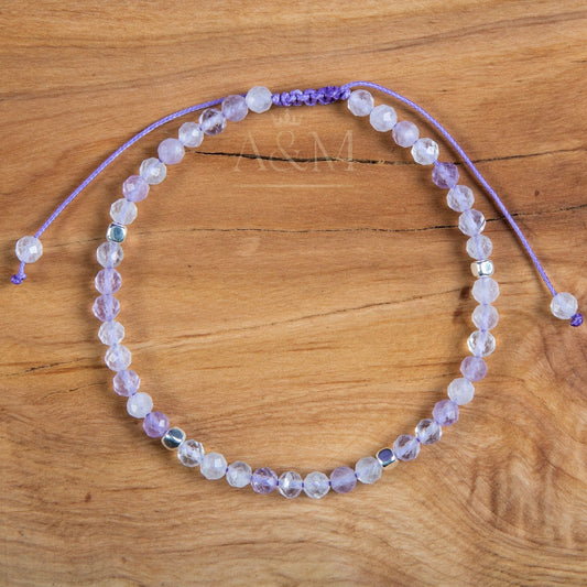 Delicate handmade bracelet featuring 4mm faceted lavender jade beads, known for their soft purple hue and calming energy. Adjustable design, perfect for a gentle pop of color or as a thoughtful, feminine gift.