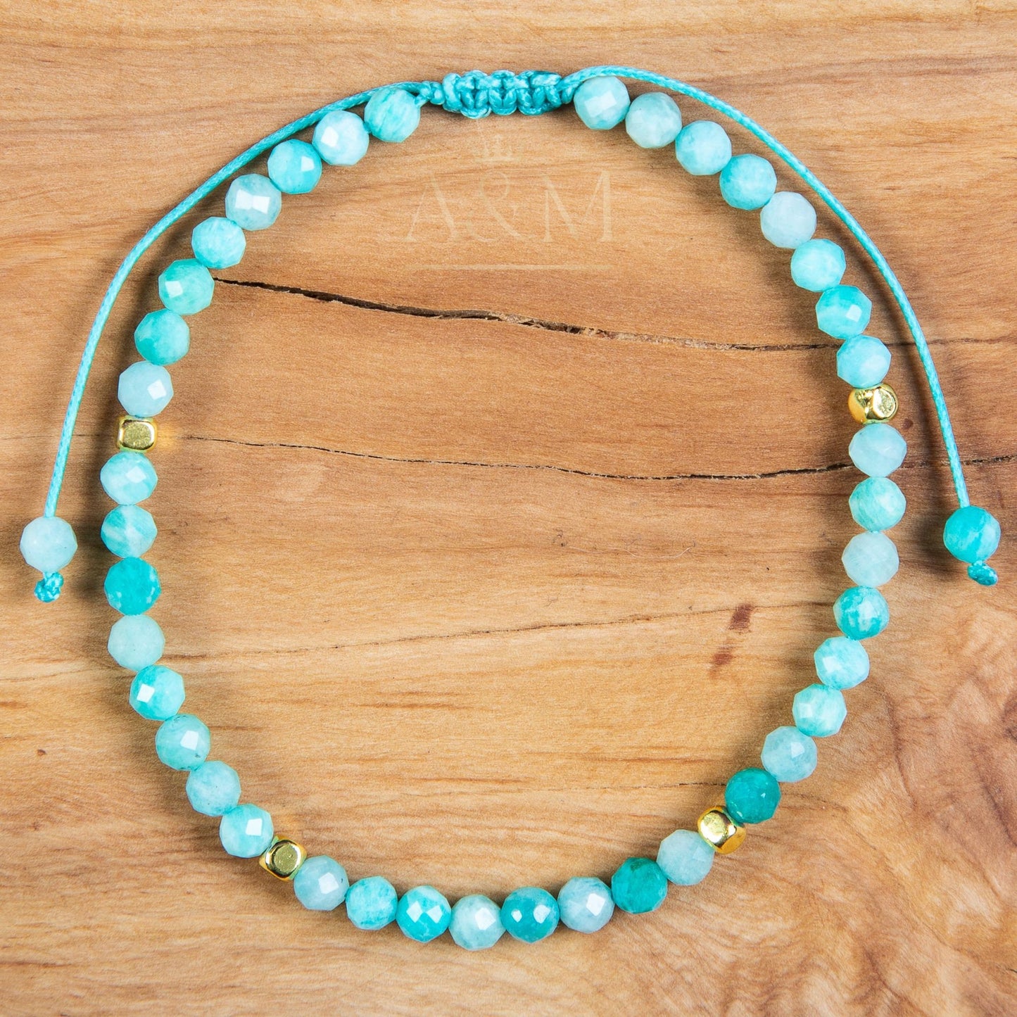 Handmade minimalist bracelet featuring 4mm faceted amazonite beads, known for their soothing blue-green color. Adjustable design, perfect for adding a calming, nature-inspired touch to your jewelry collection or as a thoughtful gift.