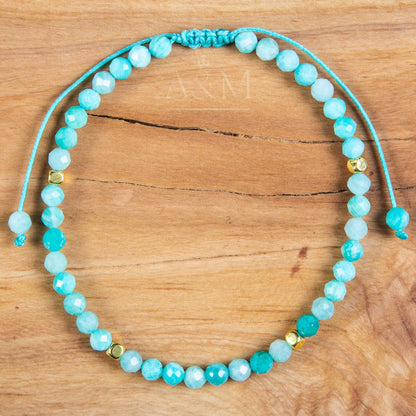 Handmade minimalist bracelet featuring 4mm faceted amazonite beads, known for their soothing blue-green color. Adjustable design, perfect for adding a calming, nature-inspired touch to your jewelry collection or as a thoughtful gift.