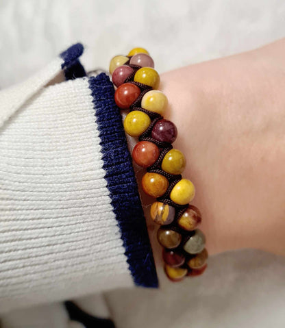 Handmade double row Mookaite bracelet with multicolored Australian jasper beads and adjustable beige macrame cord.
