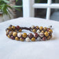 Handmade double row Mookaite bracelet with multicolored Australian jasper beads and adjustable beige macrame cord.
